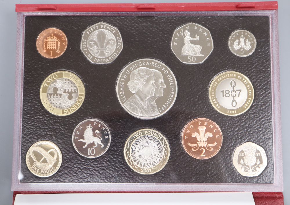 Fourteen Royal Mint UK cased proof coin year sets,